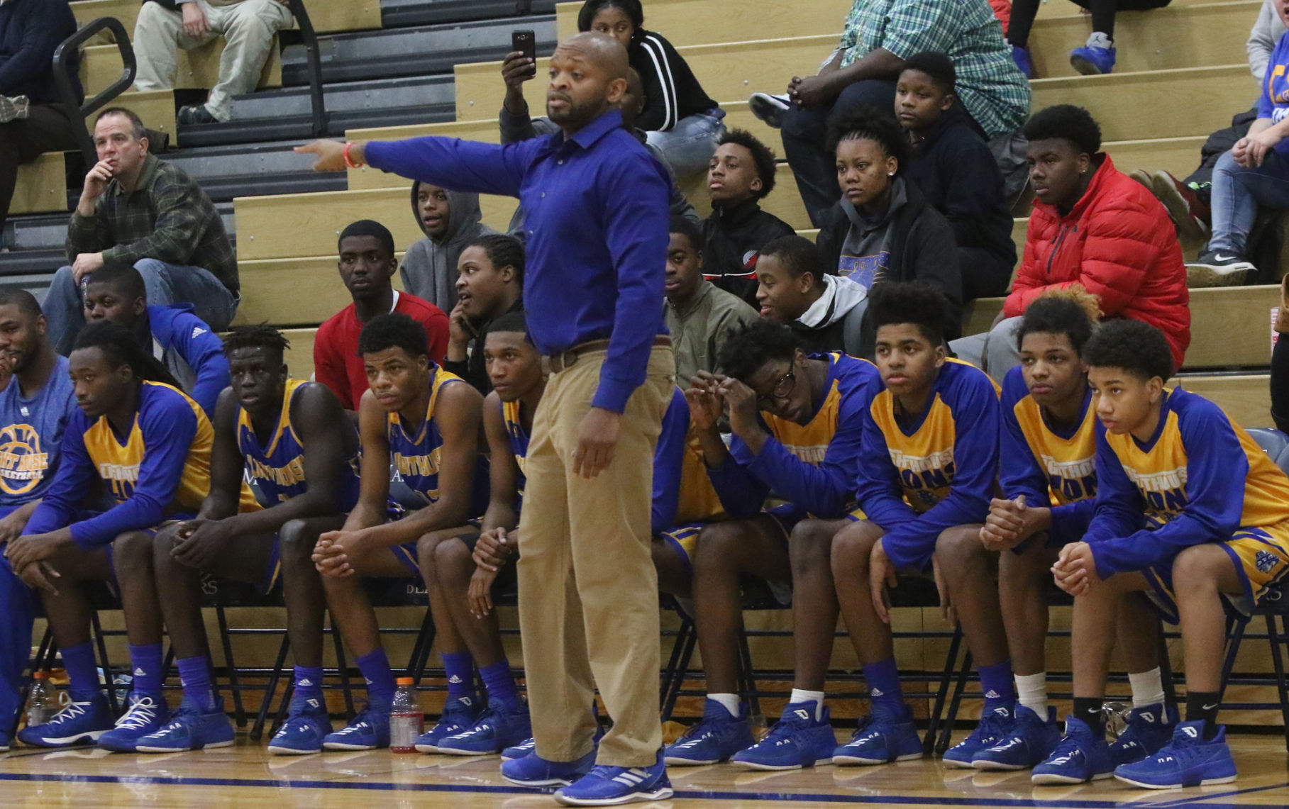 Lighthouse at Marquette Catholic boys basketball